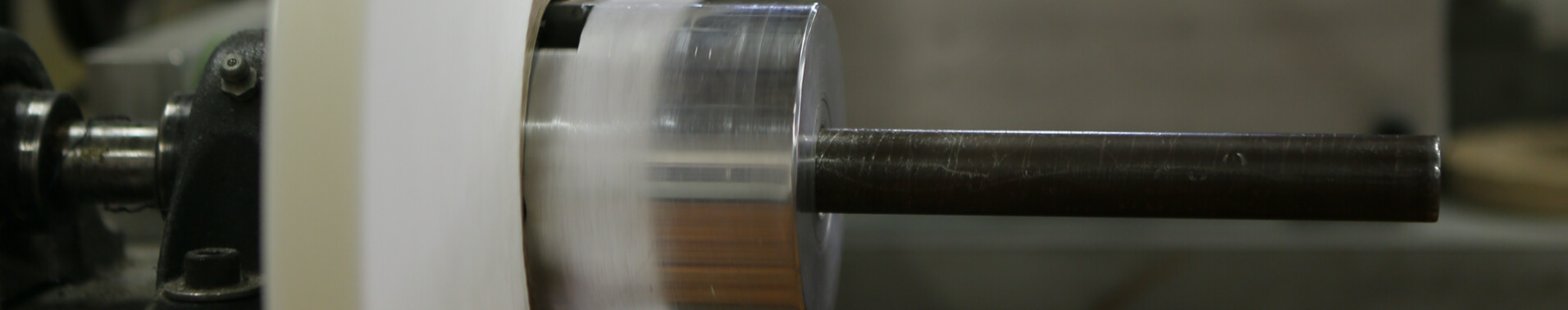 Close up of manufacturing equipment developing a custom fabric coating